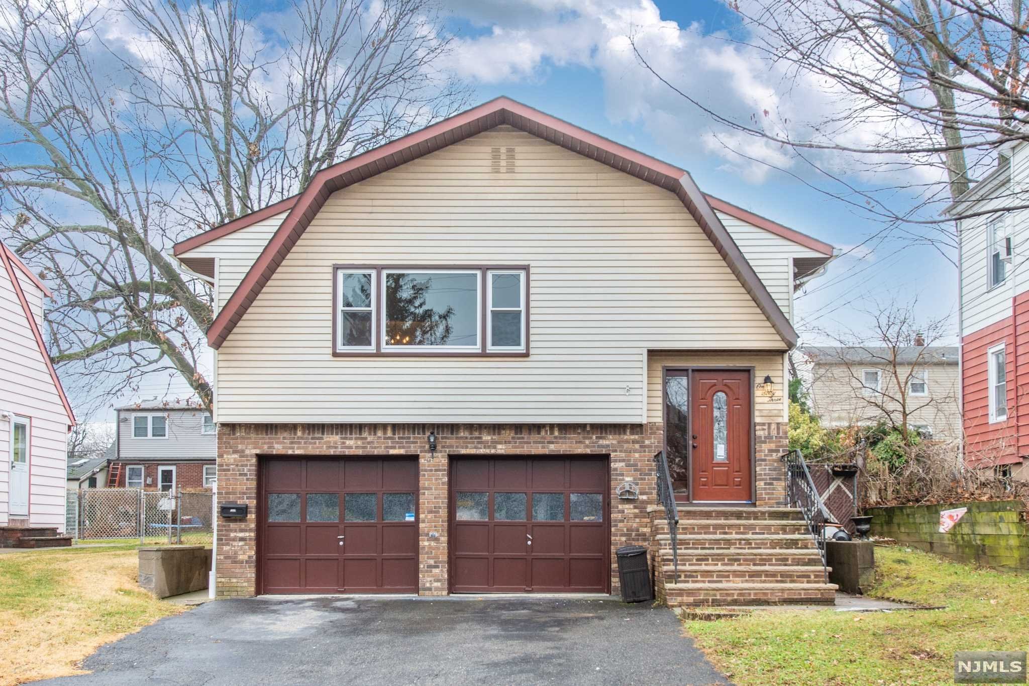 Great two-family home located near Weasel Brook Park. Both units have their own garage, laundry areas, water heaters, electric panels & heating systems. This modern home has hardwood floors, great closets, wall AC units, oversized driveway and spacious backyard. One bedroom unit on first floor - current rent is $1350. Large three bedroom unit on second floor. Fantastic opportunity!