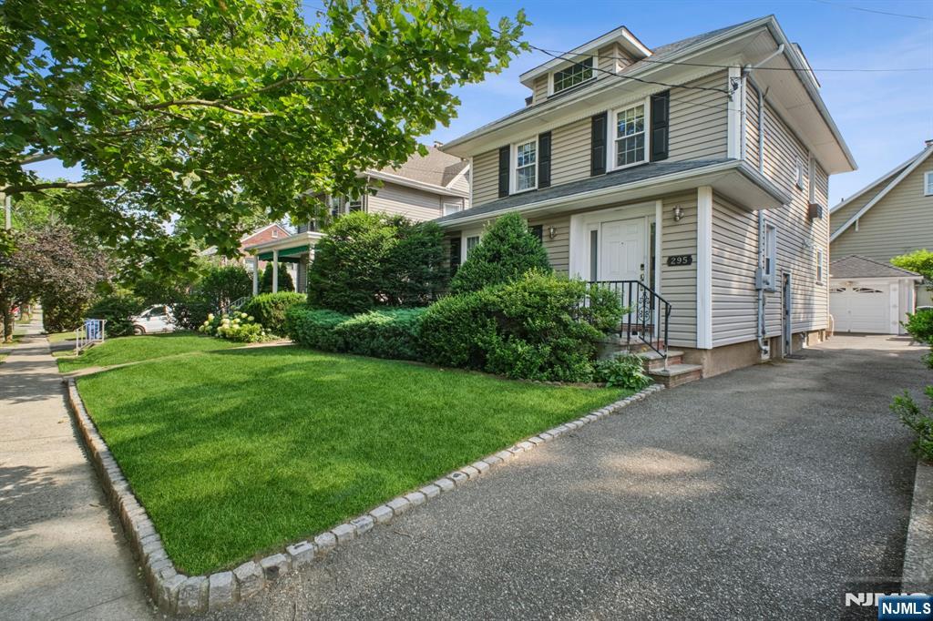 Welcome to this beautifully maintained 4-bedroom, 2.5-bathroom side-hall Colonial, nestled in the heart of Rutherfordâ€”one of Bergen Countyâ€™s most sought-after communities. Located just minutes from the bustling downtown area with its delightful shops, restaurants, cafes, and only one block to NYC bus transportation makes this home the perfect balance of suburban charm and urban convenience. The main floor includes a chef's kitchen with stainless steel appliances and granite counters with bar top area, dining area, living room with gas fireplace, and office with 1/2 bath. Upstairs you will find 3 large bedrooms, full bathroom, and 4th bedroom on the third floor. The finished basement has a family room, laundry area, an additional full bathroom, and utilities. Enjoy quality time relaxing on the updated deck, paver patio area, and fenced in yard. Other features include a detached garage, mature landscaping, wifi sprinklers, and custom mechanical shades. See the virtual tour and floor plans for more details. Schedule your private tour before its too late!