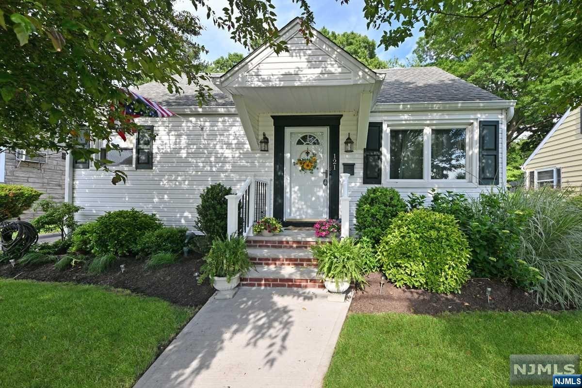 Welcome to this inviting home full of character & charm. Could this be the one you've been searching for? Conveniently located on a quiet street, in a great neighborhood, close to town, schools, parks and NYC transportation. Stunning hardwood flooring and today's most popular color choices are just the beginning. Enjoy the pleasure of air conditioning for ultimate comfort during this summer season. Offering 3 bedrooms, 2 full baths and extensive updating makes this home a desirable option. The oversized 2 car garage with plenty of storage is invaluable. The finished basement provides additional space for entertaining. The garden design and plantings create a lovely backyard retreat to enjoy meals with loved ones and create memories.