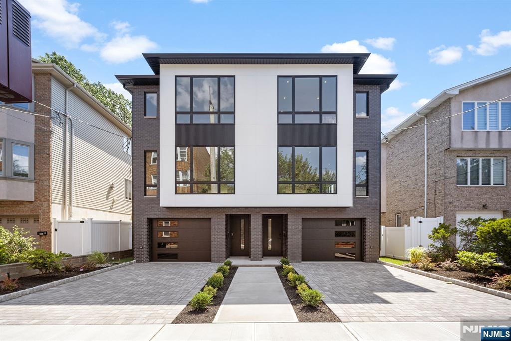 Call Ryan +1-201-988-4670 for a private tour of this New Construction Townhouse in Cliffside Park's most Convenient Location - Steps to downtown! The finest finishes - Custom Quartz Kitchen with 36 Monogram Range and High Powered Hood, Oversized Island, Full Quartz Countertop and slab. Beverage Center, Pantry, LED shelving. Private Trex deck Terrace off kitchen, versitile Open Layout, living room with fireplace and built in cabinetry. Powder Room. Spacious Primary Bedroom with High Ceilings, Primary Bathroom with double shower, double sink, and LED lighting. The ground floor features a custom built in mud room with bench and shoe rack. family room, full bathroom, and walk out access to the private back yard. Most convenient Cliffside Park location, a stones throw away from Anderson Ave - Close to Ferry, Parks, Edgewater and NYC - This is where you want to be! A quiet block without giving up city life convenience!