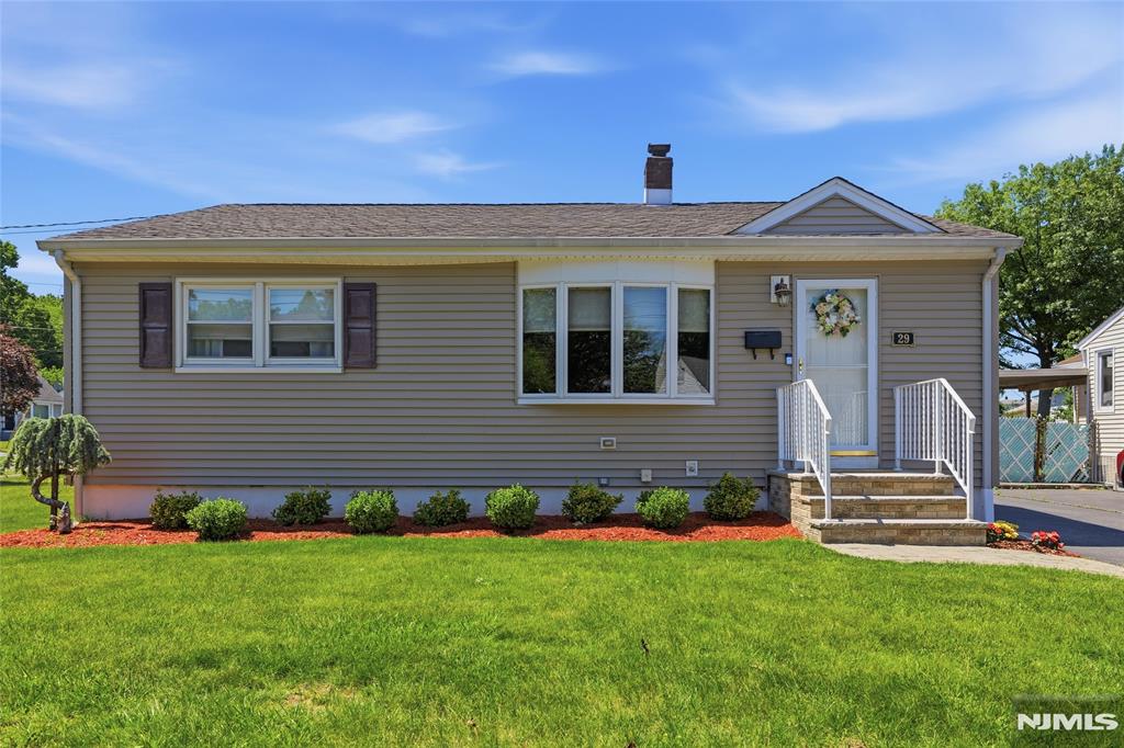 Welcome home to this beautifully maintained three-bedroom ranch, perfectly positioned on a corner lot in one of Bloomfield's friendliest pockets. Step inside to a bright, easy-living layout where a welcoming living room flows into a spacious eat-in kitchen, the kind of space made for slow morning coffee and weeknight dinners. Gleaming oak hardwood floors run beneath the carpeting throughout, ready for their next chapter, while central air and forced hot air keep every season comfortable. Three well-sized bedrooms and a full bath complete the airy main level.Downstairs, a generous family room for movie nights, a dry bar for entertaining, a summer kitchen, a convenient half-bath, and walk-out Bilco access to the backyard. Outside, enjoy a private patio, a handy storage shed, and that coveted extra corner-lot space.Recent peace-of-mind updates include a newer Square D electrical panel, a repointed chimney, and a roof with years of life ahead. All of this just minutes from Brookdale Park, Bloomfield's walkable downtown shops and cafes, and NJ Transit service to NYC in roughly 30 minutes. Move-in ready and waiting to welcome you come see it today!