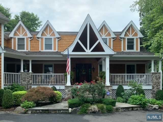 Charming Colonial on a tree-lined street w approx 1AC of land in desirable UPPER SADDLE RIVER. HEART OF THE HOME boasts MEI kitchen & large island w/seating open to family Rm & GORGEOUS stone woodburn FP! This Cozy warm room has a SLGD to a double TREX deck which overlooks the flat PARK-LIKE property. Add'l LR,DR, office/bedrm, PR,FB & elevator complete this floor. 2nd floor: 5 spacious bedrms -2 W ENSUITES, FBath,Laundry Rm. BONUS 900sf ROOM with vaulted ceilings, huge windows & elevator access. Use as a BEDRM, entertainmt space, office,gym. Has a separate entrance & Fbath for extended guests & family visits! Fin basement w GROUND-LEVEL Access + an add'l large storage RM. 2-car garage w elevator + another 1-car garage. Walkup Attic. FURNACE/ROOF/SIDING/ROOF & SEPTIC 2008. LOW TAXES,NY commute,shops parks.FREE BUS TO SCHOOLS OUTSIDE FRONTDOOR! IMPECCABLY WELL-MAINTAINED HOME SHOWS PRIDE OF OWNERSHIP. Pool & tennis club WALKABLE! Too much to list!