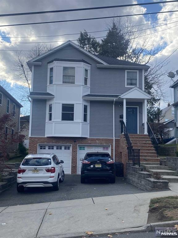 Wonderful well maintained and groomed practically newer 2015 home. One of the top rentals in Maywood. Walk 2/10 of a mile to a wonderful and charming town filled with restaurants and services. This apartment has nice hard wood floors through out. All bedrooms are of good size. Stainless appliances with dish washer, granite counters and Laundry is in the unit. A garage that can actually fit a car with a storage room as well. The 2 family has great curb appeal with stone front. Central air tops off this large apartment and parking for 3 cars. Don't miss seeing this one. Will go fast. Great shared back yard.