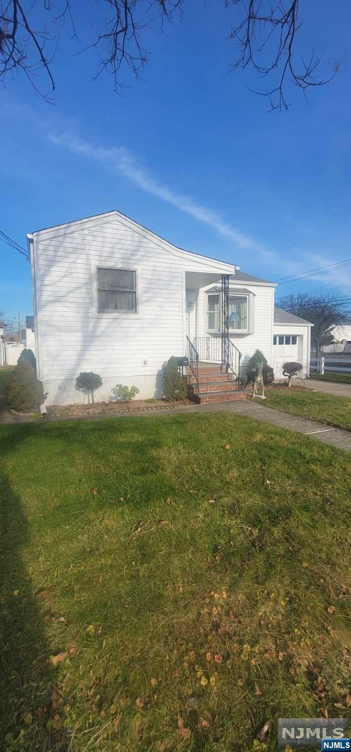 Calling all investors, contractors and those with vision. This corner property is waiting for its new owner with a vision to transform it. Expand on the current home or gut renovate as is and finish off the basement. Notable features of the property are an attached garage, central air, newer siding and newer furnace (2019). Cash or 203k loans only.
