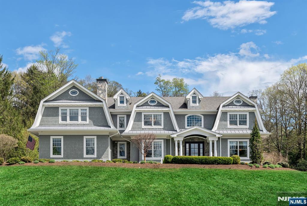 Spectacular estate built in 2017, this Hampton style custom home sits dramatically on over 2 acres. Surrounded by lush, mature landscaping, this property is a true retreat. The resort-style backyard features a pool & spa w/ auto cover, heated living room w/FP, built in grill & fire-pit. Cabana with a full bath & kitchenette. Inside, professionally designed interior showcase stunning trimwork & impeccable craftsmanship. A dramatic great rm w/ vaulted ceiling, FP, & walls of windows. A spectacular chefâ€™s kitchen featuring a large seated island, refrigeration drawers, 48â€ Wolf cooktop, Wolf microwave, double wall ovens, & Sub-Zero with access to the rear oasis. A butlerâ€™s pantry w/ a Sub-Zero wine fridge, ice maker, & sink. Formal living & dining rms provide gathering spaces. Large mudroom, golf simulator room/office, full bath, walk in pantry & entry to 3 car garage complete the 1st floor. The oversized primary suite is a true sanctuary, a double-door entry, tray ceiling, & a spa-like bath w/soaking tub, dual vanities, & steam shower, sitting rm w/ FP, custom built-ins w/ refrigerator & coffee station offers sunset views. Two walk-in custom dream closets. 3 generously sized ensuite BRs & laundry complete the upper level. The finished lower lvl offers a 3rd living space, with a rec rm, music rm, billiard area, kitchenette, BR, full bath, gym/hot yoga studio and a generator. A rare offering of luxury, privacy, & exceptional amenities in the most gorgeous setting.