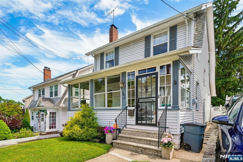Modernized 1920s Colonial in Coveted Lourdes Section. Welcome home to this sun-filled 3BR, 1.5BA Colonial blending timeless 1920s charm with a 2018 renovation. Standout features include a rare open-concept main floor plan, a first-floor powder room, an updated second-floor bath, and a dual-zone HVAC system providing central air and forced heat. The first floor boasts elegant crown molding, recessed lighting, a charming wood-burning fireplace, and seamless flow into a chef's kitchen complete with premium stainless steel appliances, stone countertops, and a matching stone backsplash. Step through sliding glass doors to a new deck and beautifully manicured lawn perfect for indoor/outdoor living. The home also features a lovely three-season front porch, a 3rd-floor walk-up bonus room, security system, and a new hot water heater. Rounding out this property is a full basement, detached garage, and a private driveway for 3+ cars. Location Highlights: A commuter's dream! Less than a 5-minute walk to the local Jitney (under 30-minute direct train line to NYC) and 15 miles west of New York City. Enjoy easy access to Rt 280 and the Garden State Parkway. Live just under 10 minutes from Downtown Montclair's vibrant shopping, dining, theaters, and museums.