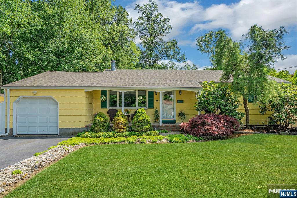 Nestled on quiet cul-de-sac ,this beautifully maintained ranch with 3 BR and 2 1/2 bath offers perfect blend of comfort, style and convenience with Inviting front porch and resort style backyard. Updated kitchen featuring custom cabinetry, granite countertops, ans SS appliances and open flow into dining area and family room -perfect for everyday living and entertainment along with living room with fireplace.Finished basement provides endless possibilities as a recreation room, home office, fitness area or media room. Outdoors, your private oasis awaits ! Sparkling in-ground pool surrounded by landscaping and spacious patio area with awning designed for summer entertaining. Brand new roof. Whole house Generac generator. Shed. Central Air. Sprinkler system. Covered front porch. Cul-de-sac .Walkable to dining, schools worship and mass transit.
