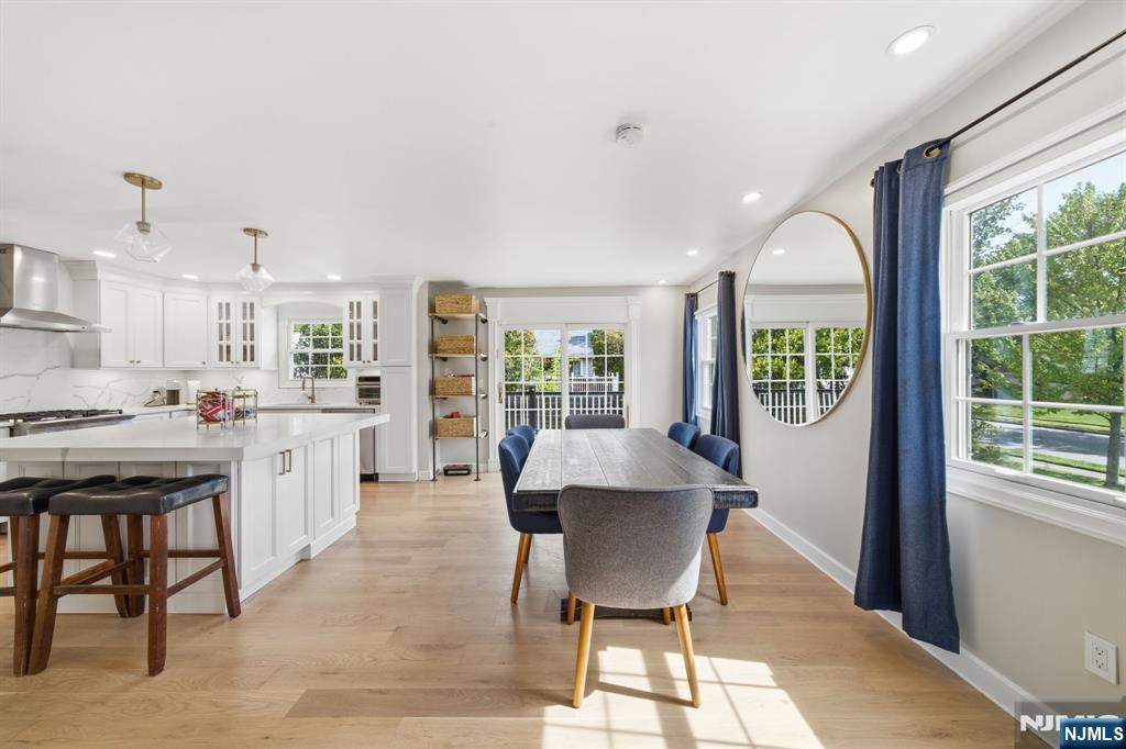 Charming three tiered Sugar Maple Split, offering a true move-in ready experience. Designed with seamless living and entertaining spaces, the home features a natural flow across the main levelâ€”ideal for both everyday living and hosting. The private primary suite provides a comfortable retreat, complete with a modern ensuite. Set on a desirable corner lot in an area of Paramus known as "The Woods", this corner property offers a rear yard that is perfectly suited for outdoor living and entertaining.