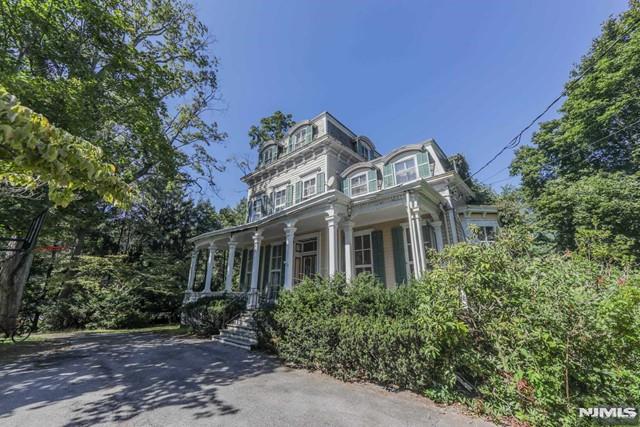 Grand Victorian home, nestled on a Sprawling 1-Acre lot, awaits your Creative Touch. With over 3500 sq. ft. of possibilities, you have the opportunity to revive its historic allure or remodel to your liking. Featuring an 800 sq.ft. Wraparound Porch, 11FT Ceilings, 7 bedrooms, 5 fireplaces, floor-to-ceiling windows and a walk-out lower level. Step into secluded tranquility amidst this serene landscape, offering the perfect opportunity to create your dream oasis and tranquil pool. And, if you desire, explore the potential for subdivision. Norwood's top-rated schools, scenic streets, and vibrant community make it the perfect location! Don't miss out Call today , This is your chance to bring your vision to life.