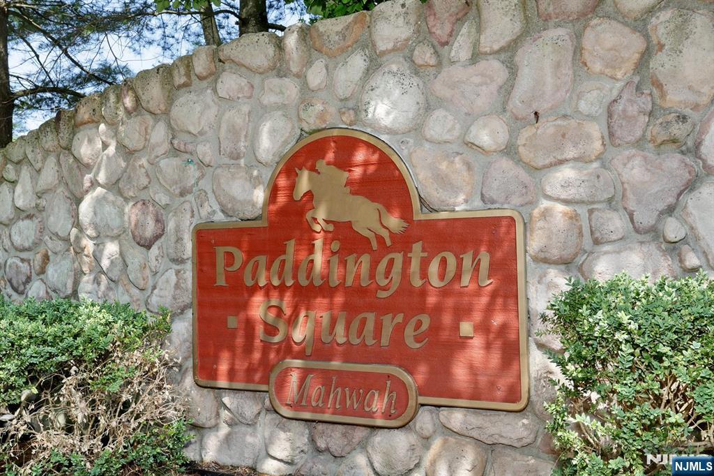 Paddington Square Perfection! Welcome to this spacious and sun-filled first floor (no steps) 2-bedroom, 2 full bath condo in desirable Paddington Square. Featuring beautiful hardwood floors throughout and tastefully updated bathrooms, this home offers the perfect blend of comfort and style. The bright, open living spaces flow effortlessly to a private deck, ideal for morning coffee or relaxing outdoors. A rare bonus, the enormous full unfinished basement provides endless possibilities for storage, a workshop, home gym, or future expansion. Conveniently located close to shopping, dining, transportation, and everyday conveniences, this move-in ready home is one you won't want to miss!