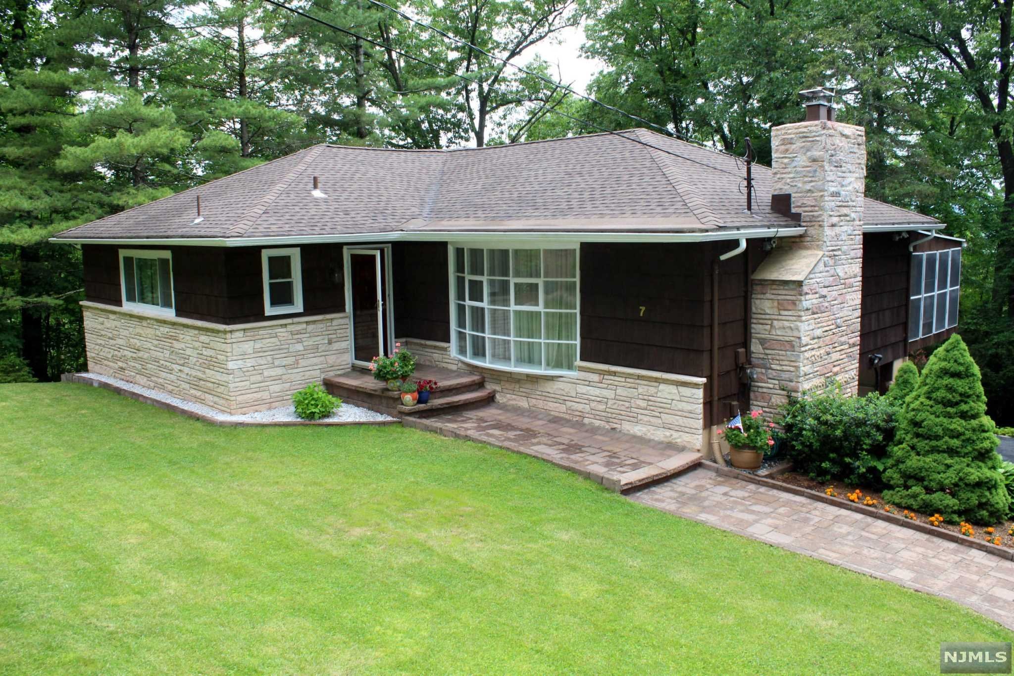 Come and take a look at this this beautifully maintained property located in the Scenic Lakes private community, in Hardyston, Sussex County, NJ. Vacation like set up with community amenities such as private beach, fishing, grilling and so much more welcomes you to this scenic neighborhood. This raised ranch offers 3 bedrooms, 2 full bathrooms, eat in kitchen, dining room, living room and covered deck with access to outdoor deck on the lower floor and patio. The lower level offers family room, fourth bedroom, half bath/laundry room, storage/utility room and garage. Access to manicured backyard, carport or covered patio. The home features a wood burning fireplace, hardwood floors, new roof and recently replaced water heater just to name a few. There is an attached 1 car garage and a large driveway suitable for several cars. Don't wait, set up your showing today and make this dream home yours today!