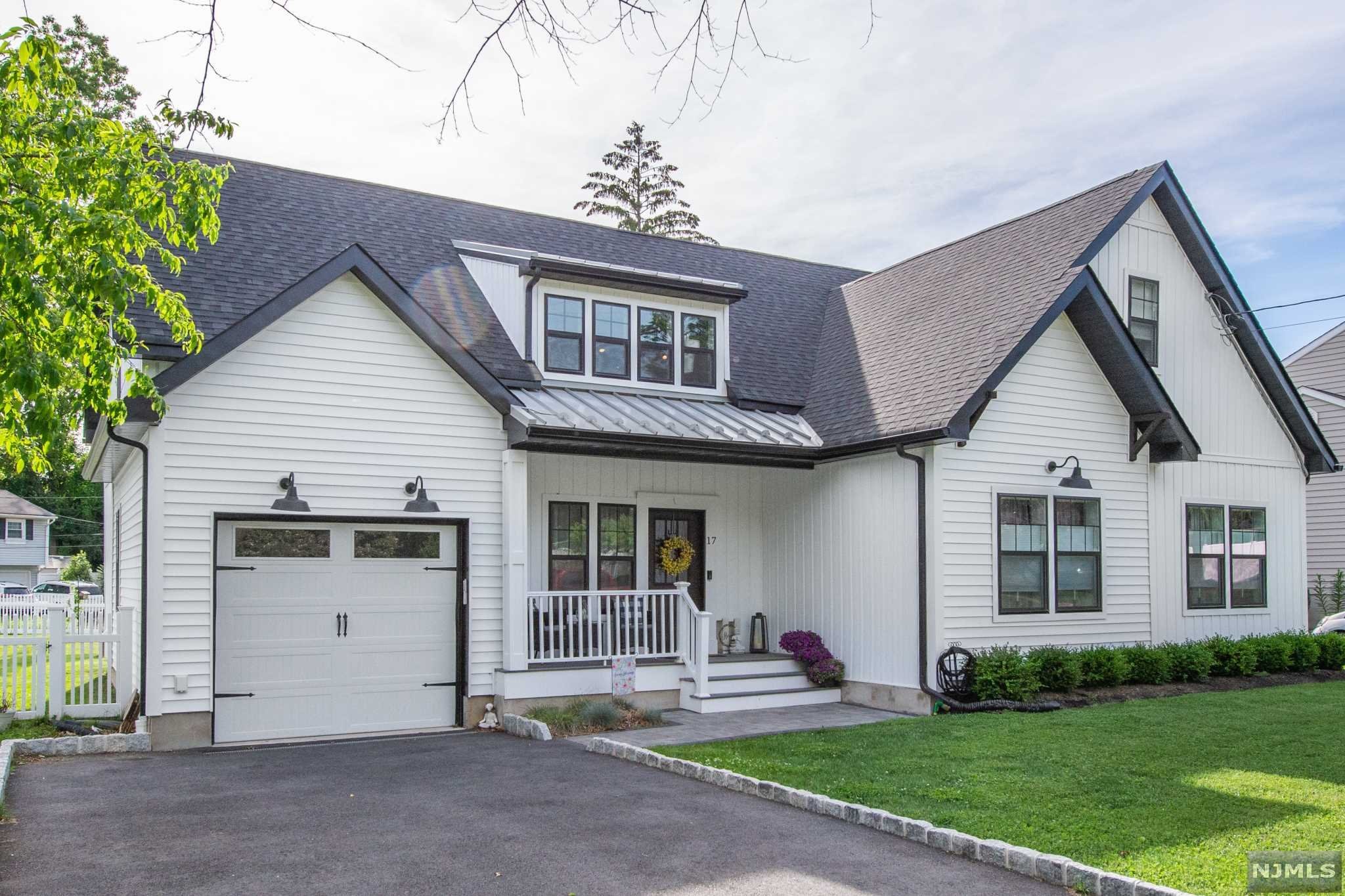 Pristine, Updated Custom Home! Expanded ranch style with primary suite on main level! Charming through & through! Bright, open layout with HIGH ceilings. Renovated top to bottom in 2020. Lovely Architectural Features, Give this Home a "Magnolia Homes Feeling.. Ya know, Chip & Joanne?! This house offers today's most popular features. Prepare to be impressed with this home. Open floor plan, dark hardwood floors, cathedral ceilings, high end fixtures, top notch finishes & attn to detail. Large living opens to the gorgeous highly functional kitchen features quartz countertops, SS appliances, natural tile backsplash, solid white cabinetry & a gorgeous oversized gray center island that ties in the whole space. 3 first floor bdrms w/ 2 full baths including the primary suite. Upstairs, a spacious loft that overlooks the first level, powder room and office or 4th bedroom. A laundry/mudroom right from your Pinterest board and large one car garage. Great outdoor space.. Completely fenced in.