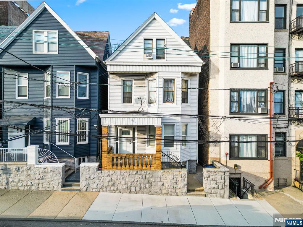 Unbeatable Weehawken location! This turnkey, legal 4-family home is steps from Boulevard East and offers a total of 10 bedrooms and 4 full bathrooms in move-in condition. The upper floors feature very spacious layouts with living room, eat-in kitchen, walk-in closets, two large bedrooms, and a versatile bonus room/den. Unit #4 is a fully finished basement apartment with Living Room, Kitchen, one bedroom, a bonus room, and ample storage. The property includes separate utilities and a large backyard accessible from the first-floor unit. A commuterâ€™s dream, you are steps from the NYC bus, a 6-minute walk to the Light Rail, and one mile from the Lincoln Tunnel, providing effortless access to NYC, Hoboken, and Jersey City. Must see!