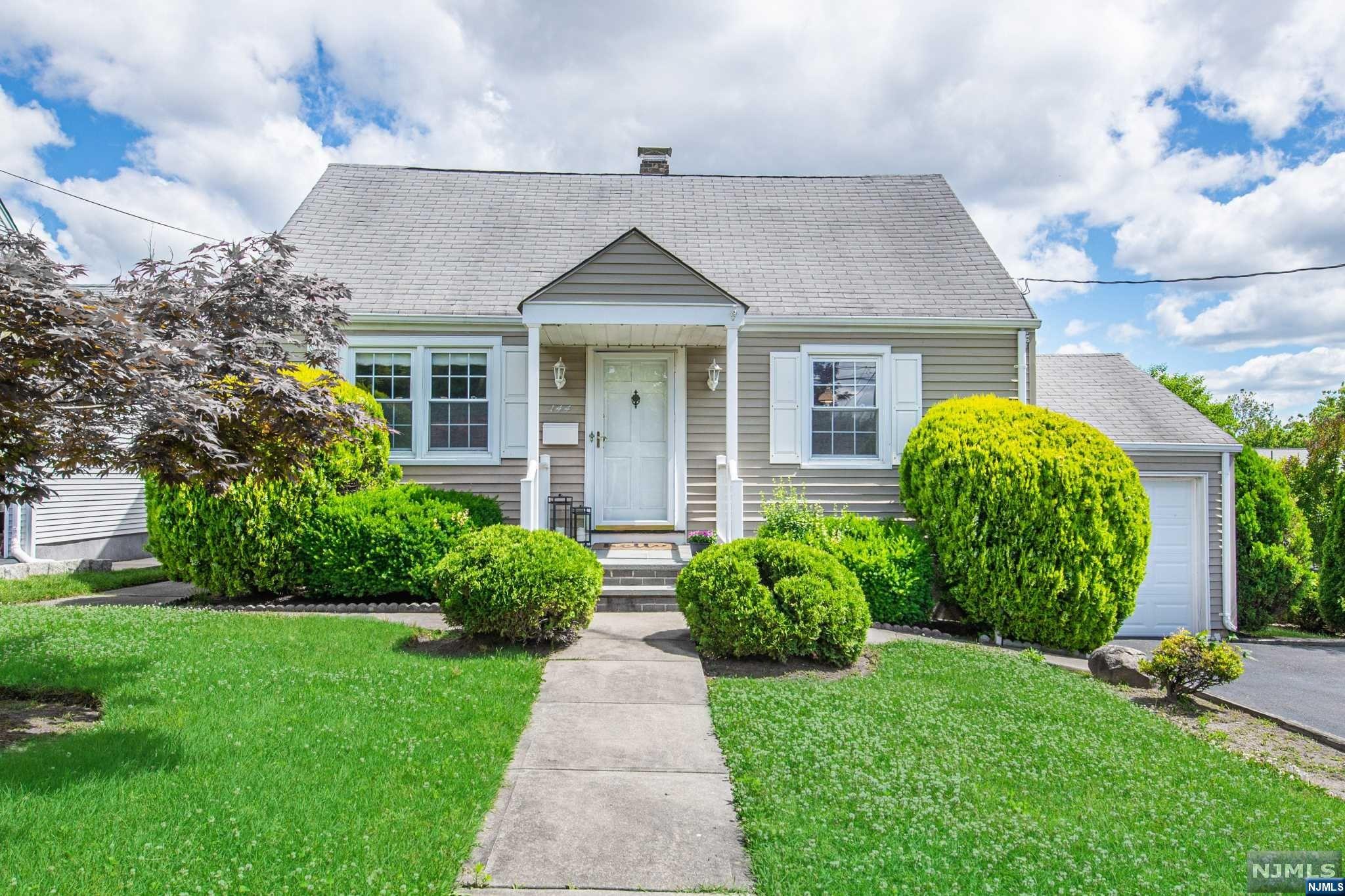 This charming Cape Cod style, 3 bed house close to Albion Park, offers the opportunity to create your dream home in a desirable Clifton neighborhood. The first floor features a living room, a dining room which can be converted to a 4th bedroom if needed, eat-in kitchen with plenty of cabinets, a bedroom, and a full bath with tub. The second floor has 2 bedrooms, an open loft area perfect for a home office and a good deal of storage. The basement provides ample space for customization, allowing you to create the ideal entertainment space. Enjoy the sunshine on the deck overlooking the lovely yard where you can catch a glimpse of the NYC skyline. A one-car attached garage has a brand new garage door with a wide driveway makes this just the right home. Located conveniently to transportation with easy access to buses, parks, shopping, entertainment, and schools. Don't miss the opportunity to make this home your own! Home being sold strictly As-Is.