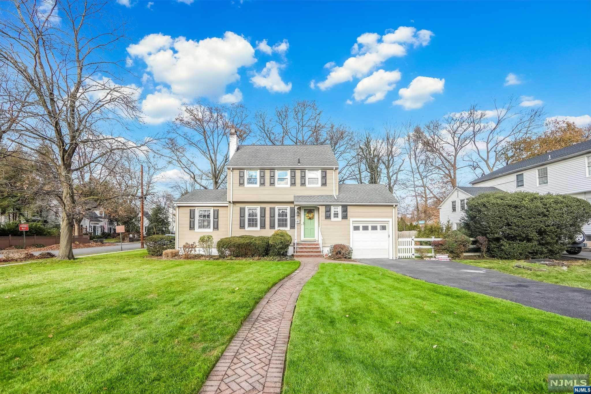 First time offered in over 50 years in the highly desirable town of HoHoKus close to school, downtown and NYC train & bus. This 3 Bedroom, 1.5 Bath Roughgarden built Colonial has been lovingly maintained and updated over the years and features hardwood floors, crown moldings, built ins & central air. The first floor includes Living Room with fireplace, Dining Room with built- ins, updated Kitchen with granite countertops & custom cabinetry, Powder Room and Family Room addition (12' x 22.5')with hardwood floors. The second floor includes Primary Bedroom, Full Hall Bath ( SOT), two additional Bedrooms and Attic access. All bedrooms have cedar lined closets & hardwood floors. Newly finished Basement with tile flooring is perfect for a Rec Rm, Gym or Home Office. Laundry Area and storage. One Car Attached Garage, newer landscaping, central air. Owner does not use fireplace, no known issues- sold AS IS.