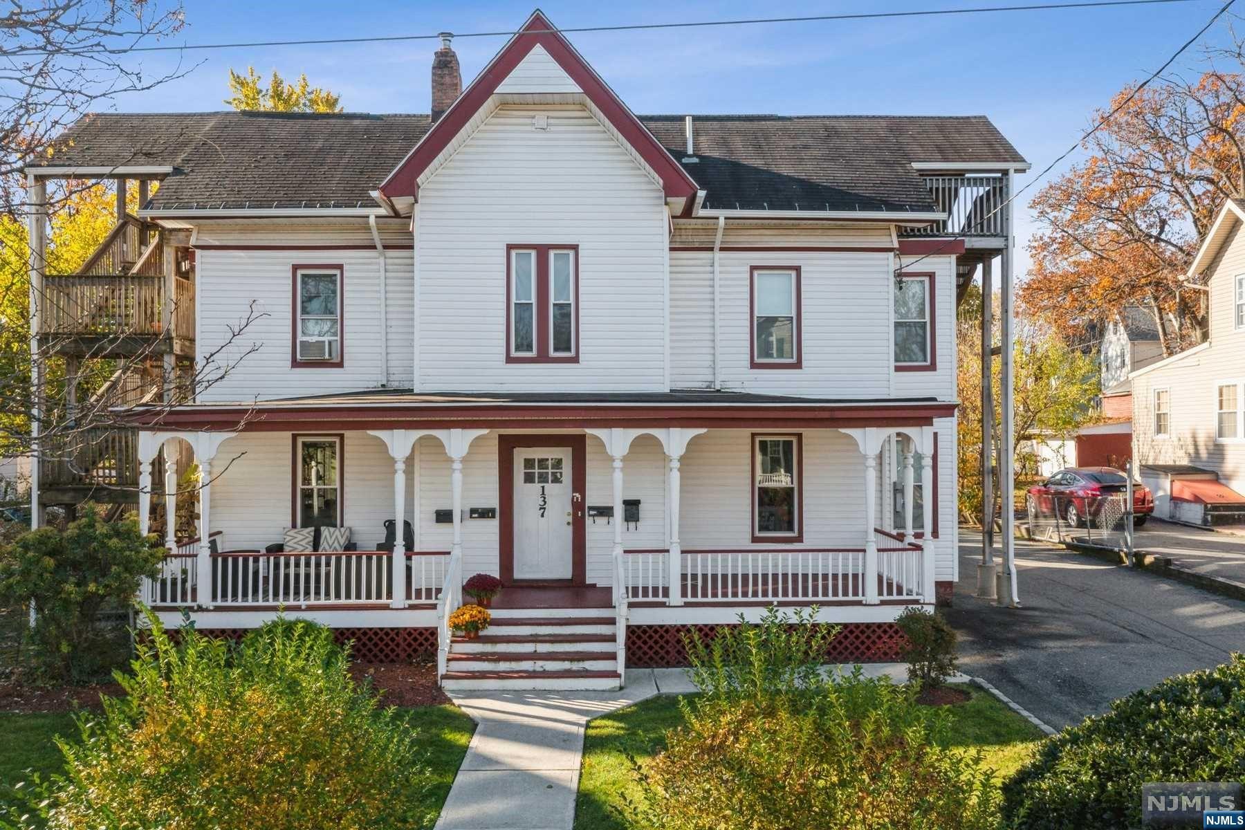 A unique opportunity in the heart of the Walnut Street district sits this 1/2 acre property with huge potential. The urban vibe has so much to offer in the way of shopping, restaurants, a brewery, & train station. A legal two-family Victorian home with a boarder apt occupies the street front. Current owners have approved variance and architectural plans, allowing for an additional five-unit building at the rear of the property. These opportunities don't come around often so don't miss out on this one.