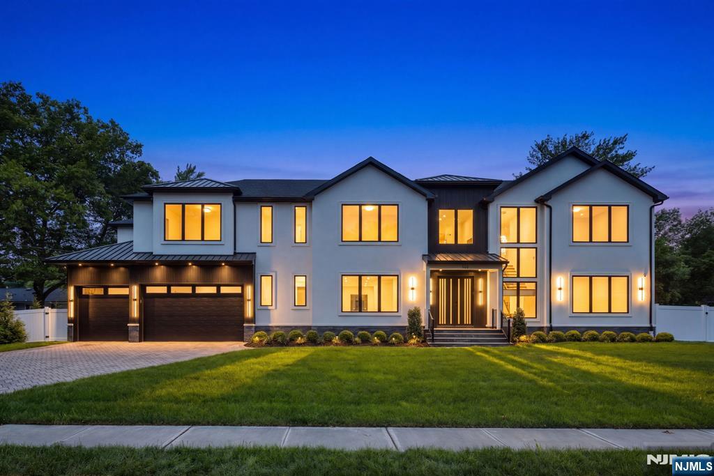 Experience exceptional luxury in this brand-new construction approx. 7,000 SF residence in the sought after area of Paramus on a rare .288-acre property, offering 6 bedrooms, 6 full bathrooms, and 2 half bathrooms. Designed with impeccable craftsmanship and premium finishes throughout, this spectacular home features an open-concept layout with a grand living room, formal dining room, designer eat-in kitchen equipped with top-of-the-line Thermador appliances, spacious family room with exposed wood beam ceilings & walk-in pantry. The home showcases stunning hardwood flooring, Marvin windows, modern glass railings, built-in speakers, security cameras, and whole-home WiFi for seamless smart living. The upper level offers five spacious bedrooms, each thoughtfully designed for comfort and privacy. The fully finished lower level is an entertainer's dream, complete with a theater, wet bar, private gym, additional bedroom, and full bathroom. Step outside to your private backyard oasis featuring a gunite pool, covered patio perfect for year-round entertaining, and professionally designed outdoor living spaces. Additional highlights include a 3-car garage with extra-high ceilings, elegant paver driveway, and exceptional attention to detail throughout. Extraordinary new construction combines outdoor living, timeless elegance, modern amenities, and an unbeatable Paramus location.