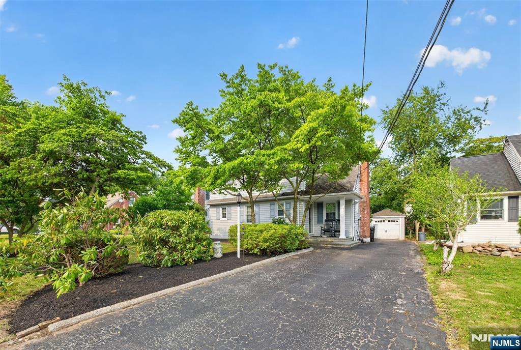 Step into to your own private garden oasis situated in a wonderful location on a picturesque tree lined street. This home has timeless charm and character as well as an inviting feel that offers comfort, a flexible floor plan, and easy living in a convenient location near schools, parks, shopping, dining, transportation to NYC and near downtown Cresskill. Enjoy all this property has to offer. Put your signature on this one!