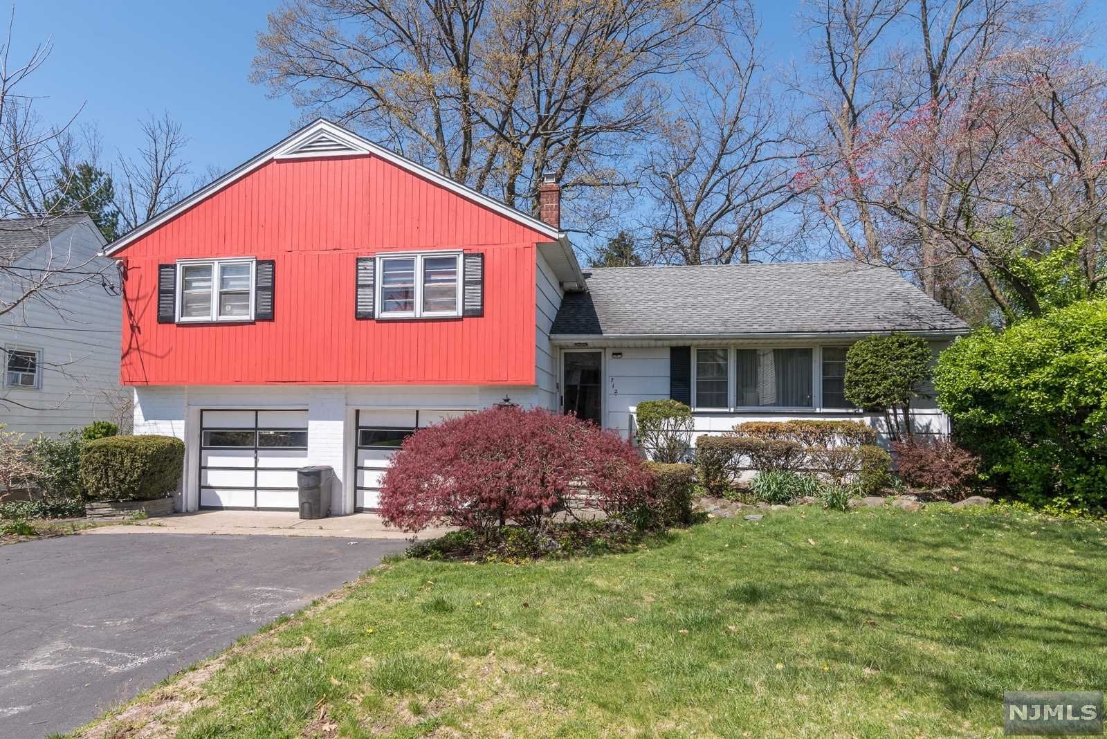 Large, light, and bright, nicely maintained expanded split level located on a quiet, dead end street in the Country Club section of Teaneck. Entry foyer, large living room, formal dining room, family room/bedroom with sliders to deck, vaulted ceiling and skylight, full bath, large eat-in kitchen with vaulted ceiling, skylight and separate eating area on first floor. Step down to a family room with stone fireplace and sliding glass doors to patio and powder room. Finished basement with laundry. Upstairs is a master bedroom with full bath, two additional bedrooms and another full bath. 4 zone heat, central air, 200 amp electric, alarm, sprinklers, 2 car attached garage with electric eyes and more.