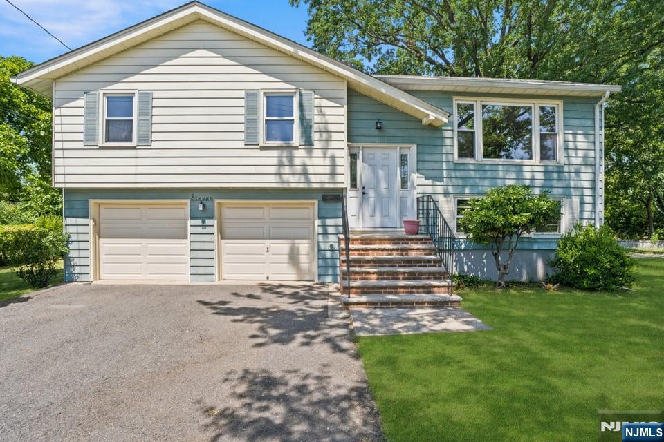 Perfectly positioned in one of Leoniaâ€™s most desirable neighborhoods, 11 Ray Avenue offers the ideal blend of comfort, versatility, and everyday convenience. This beautifully maintained 4-bedroom residence features approximately 1,967 square feet of thoughtfully designed living space, including 1 full bath, 2 half baths, and multiple areas tailored for both relaxation and entertaining. Step inside to a welcoming main level where the spacious family room, dining area, and well-appointed kitchen come together to create a warm and inviting atmosphere. The lower level adds even more flexibility with an additional living room, breakfast nook, bedroom, half bath, laundry area, and direct access to the attached 2-car garage. Outside, a generous deck overlooks the backyard, providing the perfect setting for morning coffee, weekend gatherings, or unwinding at the end of the day. With ample storage and a layout that adapts effortlessly to a variety of lifestyles, this home offers both functionality and charm. Ideally located near Overpeck County Park, local shops, restaurants, major highways including Routes 4, 46, and I-95, and convenient NYC transportation, 11 Ray Avenue presents a rare opportunity to enjoy the best of Bergen County living.