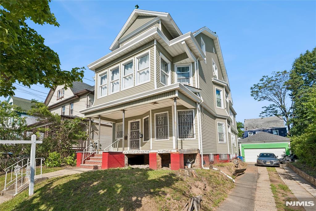 Welcome to this exceptional opportunity in Newark's Upper Clinton Hill neighborhood. This legal two-family property offers generous living space across three levels, providing flexibility for day-to-day living or rental income. Updated in 2023, it features an updated exterior with vinyl siding, private driveway, and detached two car garage, this property combines classic character with long-term potential. Both units offer spacious layouts with abundant natural light and large rooms. The finished basement adds valuable bonus space, providing additional flexibility for a rec room, storage, or work-from-home needs. Conveniently located near Route 22, I-78, the Garden State Parkway, Newark Liberty International Airport, NJ Transit, shopping, dining, schools, parks, and downtown Newark. Commuters will enjoy easy access to New York City.