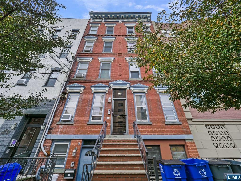 HIDDEN GEM! PRIME HOBOKEN LOCATION! RARE EXPANSIVE PRIVATE BACKYARD! The kitchen has custom cabinets, granite countertops, stainless steel appliances which opens up to a cozy dining area. Redone floors and Bathroom! The bedrooms have lots of closet space and the bathroom includes a tub shower with additional storage. The living room is bright and welcoming, with large windows that let in plenty of natural light and lead out to your private patio. Perfect for summer fun! This unit is perfectly located to the PATH train, light rail and bus stops to NYC, plus it's near all the good spots on Washington Street for eating out at great restaurants, bars and nightlife! This unit features the convenience of an in-unit washer and dryer. Perfect mix of comfort and convenience!