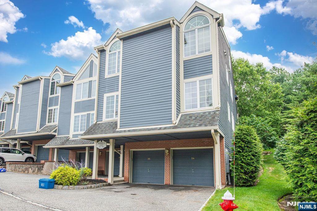 Welcome to this beautifully maintained condominium in the highly sought-after Cambridge Heights community of Ramsey. This bright and inviting home offers approximately 1,020 square feet of comfortable living space with an open floor plan designed for today's lifestyle. The spacious living and dining areas flow seamlessly, creating the perfect setting for relaxing or entertaining. Enjoy a well-appointed kitchen, generously sized bedrooms, ample closet space, and the convenience of in-unit laundry. Step outside to your private outdoor space, ideal for morning coffee or unwinding at the end of the day. Cambridge Heights offers outstanding amenities including a clubhouse, outdoor pool, tennis courts, fitness center, and beautifully landscaped grounds. Conveniently located near downtown Ramsey, shopping, restaurants, major highways, and NJ Transit, this home combines low-maintenance living with an exceptional location. Don't miss this opportunity to enjoy one of Bergen County's most desirable communities. HOA Fees: $353 For a private showing Sergio 201-707-2337