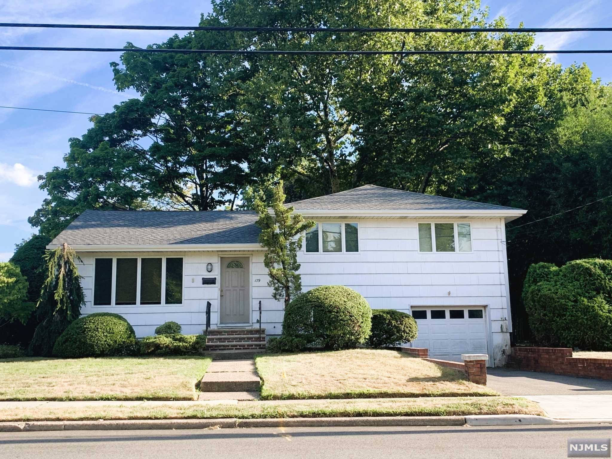Situated on a corner lot, a little west of Knickerbocker Rd, come see this great split level home for sale. First floor features Living Rm, Formal Dining Rm, Eat-in-Kitchen with a door to back yard patio and yard. The 2nd floor features 3 Bedrooms and a Full Bathroom. At ground level, a few steps down from the kitchen, there is a rec room, w access to the crawl space, a 1/2 bathroom, laundry and utilities. Recent updates include: Furnace replaced Jan 2022, New Roof and Gutters in October 2021, Central Air Installed in June 2019, Water Heater installed in July 2018. Close to NYC Transportation. To set a private showing, call Eileen directly at 201.220.0579. Listed by C21 Concept 100.