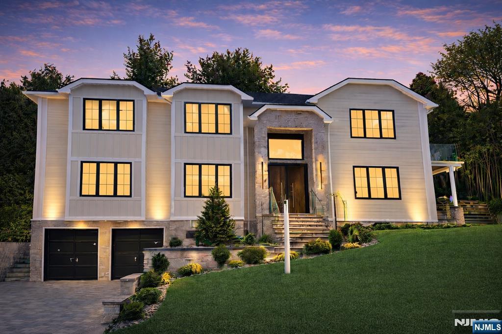 New construction on Closterâ€™s sought-after East Hill offering over 6,000 sq ft of exceptional living space across three expansive levels. This stunning 6-bedroom, 5.5-bath residence showcases modern luxury, scale, and abundant natural light throughout. The open-concept main level is anchored by a designer European-style kitchen featuring quartz countertops, oversized center island, Thermador appliances, and custom cabinetry. Refined finishes include radiant heat, heated porcelain floors, white oak herringbone hardwood flooring, and sleek floating fireplaces. The luxurious primary suite offers a private terrace, a walk-in closet, and a spa-inspired bath. The finished lower level is ideal for entertaining with a spacious recreation lounge, bar, wine room, private bedroom, and full bath. Outdoor living is enhanced by covered patios, outdoor kitchen, bluestone stairways with glass railings, and a dramatic 2-car garage with glass doors. Additional highlights include smart home lighting, security cameras, full-house generator, and room for a pool (not included). Conveniently located near Blue Ribbon schools and Closter Plaza.
