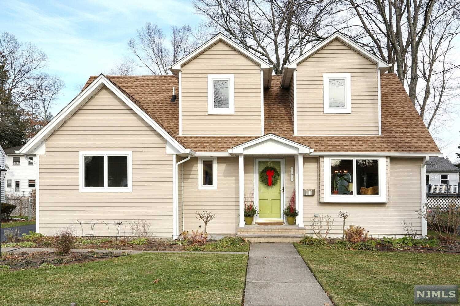Beautifully updated/renovated, light and bright 3 bedroom, 2 bath Cape Cod home in the sought after town of Waldwick. The first floor features living room, dining room, updated kitchen with custom white Shaker cabinets and stainless appliances including Bosch oven with warming drawer, primary bedroom with large double closet, second bedroom and updated full bath. The expanded second floor offers a loft/library, 2nd primary bedroom with large storage closets and second updated full bath. There are many amenities including hardwood floors, central air, new hot water heater, newer furnace and deck off the kitchen. You will love the spacious rear yard with beautiful landscaping and planting beds. This home is ideally located near schools, parks and transportation. A wonderful place to call home - come visit today!