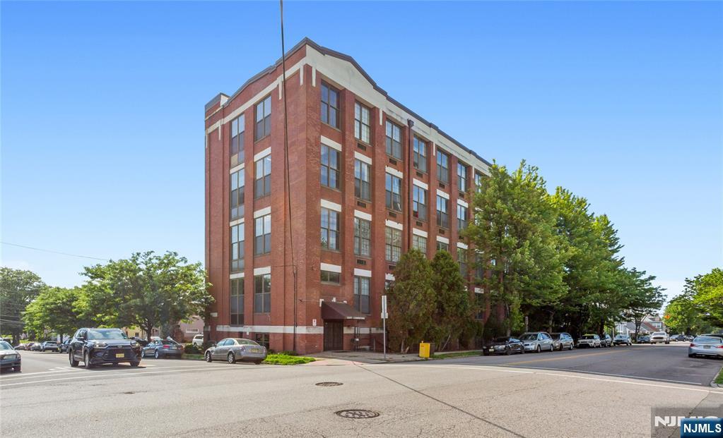 Experience NYC loft living without the NYC price tag! Located in the desirable Crooks Ave/Lakeview section of Paterson, this stylish 1-bedroom loft-style condo offers the perfect blend of character, comfort, and convenience.Step into a bright and airy living and dining area featuring soaring high ceilings, oversized windows, and beautiful hardwood floors throughout. The spacious living room includes a large closet for additional storage. The updated open-concept kitchen is designed for both everyday living and entertaining, featuring granite countertops, abundant cabinet space, and a two-tier breakfast bar perfect for casual dining. A striking spiral staircase leads to the loft bedroom, complete with a walk-in closet/utility room. This all-electric unit also features 2 newer heating/AC units and a newer hot water heater. Laundry facilities are conveniently located on the ground level. Parking available for only $32/month.1 car only Ideal commuter location close to buses, major highways, shopping, restaurants, and more. Donâ€™t miss this opportunity to own a unique NYC-style loft in a prime location!
