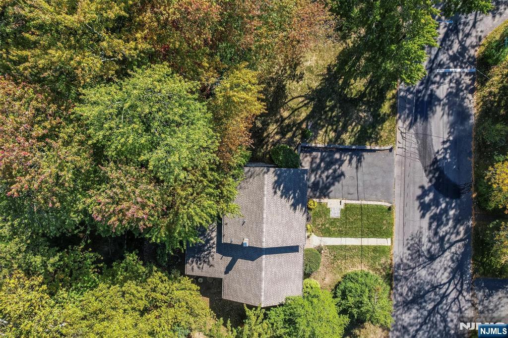 Exceptional opportunity to purchase close to a half-acre in a quiet corner of Demarest's coveted East Hill. Don't miss this prime location that's hard to come by. Nestled in a quiet corner of Demarest's East Hill. This oversized property offers privacy and natural beauty in a most sought after location.