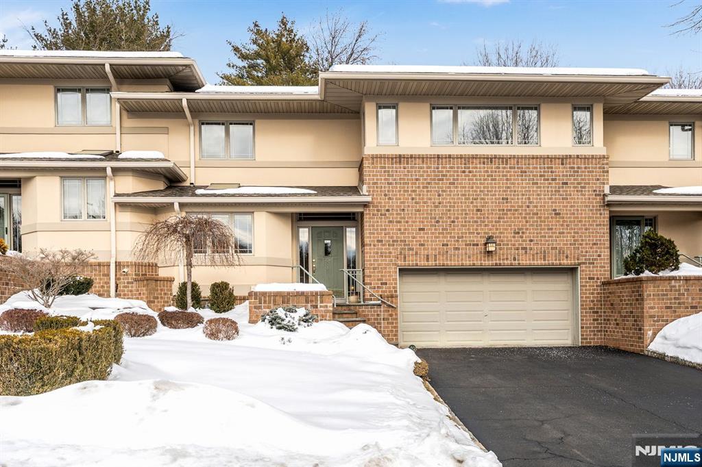 WELCOME TO THIS BEAUTIFULLY MAINTAINED 3 LEVEL TOWNHOME IN THE HIGHLY DESIRABLE FOX RUN COMMUNITY OF ALLENDALE, BORDERING THE CELERY FARM, A TRANQUIL 100+ ACRE NATURE PRESERVE. THIS HOME OFFERS A RARE COMBINATION OF NATURAL SURROUNDINGS, MODERN COMFORT AND GENEROUS LIVING SPACE. THE OPEN CONCEPT MAIN LEVEL FEATURES HARDWOOD FLOORS THROUGHOUT. A SPACIOUS LIVING ROOM WITH A GAS FIREPLACE AND SKYLIGHT FLOWS SEAMLESSLY INTO A LARGE DIING AREA WITH DIRECT ACCESS TO A PRIVATE OUTDOOR DECK. THE EXPANSIVE KITCHEN INCLUDES AMPLE CABINETRY, STAINLESS STEEL APPLIANCES, AND A BRIGHT BREAKFAST AREA--IDEAL FOR EVERYDAY LIVING AND ENTERTAINING. UPSTAIRS, THE PRIMARY BEDROOM PROVIDES A PEACEFUL RETREAT WITH AN UPDATED ENSUITE BATH AND TWO WALK-IN CLOSETS. TWO ADDITIONAL WELL PROPORTIONED BEDROOMS, AN ARTIST'S LOFT, AND THE CONVENIENCE OF SECOND FLOOR LAUNDRY COMPLETE THIS LEVEL. THE FINISHED LOWER LEVEL ADDS EXCEPTIONAL VERSATILILTY WITH A FULL BATH AND MULTIPLE USE OPTIONS, INCLUDING A HOME OFFICE, MEDIA ROOM, RECREATION SPACE OR GUEST ACCOMMMODATIONS. LARGE WINDOWS BRING IN ABUNDANT NATURAL LIGHT, AND A WALK-OUT LEADS TO A PRIVATE REAR PATIO SURROUNDED BY GREENERY. ADDITIONAL HIGHLIGHTS INCLUDE AN ATTACHED 2 CAR GARAGE AND AMPLE STROAGE THROUGHOUT. ALL THIS IN A SOUGHT AFTER ALLENDALE LOCATION WITH NATURE AT YOUR DOORSTEP!