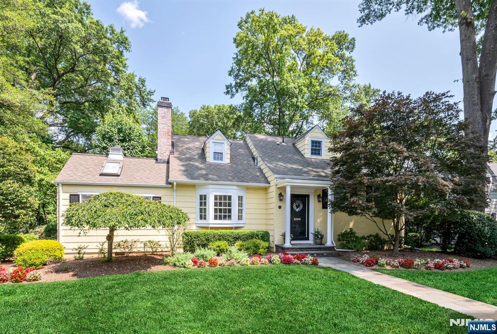 Move right into this beautifully maintained 5-bedroom, 3.5-bath home offering space, comfort, and modern living. The welcoming layout features a double-sided fireplace shared between the living room and home office, creating a warm and inviting atmosphere perfect for both relaxing and working from home. The modern kitchen flows seamlessly into the spacious family room, complete with a fireplace and custom built-ins, creating an ideal setting for everyday living and entertaining. The spacious primary suite serves is a private retreat with a spa-like bath and windows overlooking the rear yard, bringing in natural light and peaceful views. Four additional bedrooms provide flexibility for family, guests, or additional workspaces. Step outside to enjoy the expansive rear yard, offering plenty of room for outdoor entertaining and play. Ideally located close to top-rated schools, transportation, and charming downtown Ho-Ho-Kus, this move-in ready home offers the perfect combination of convenience, space, and lifestyle.