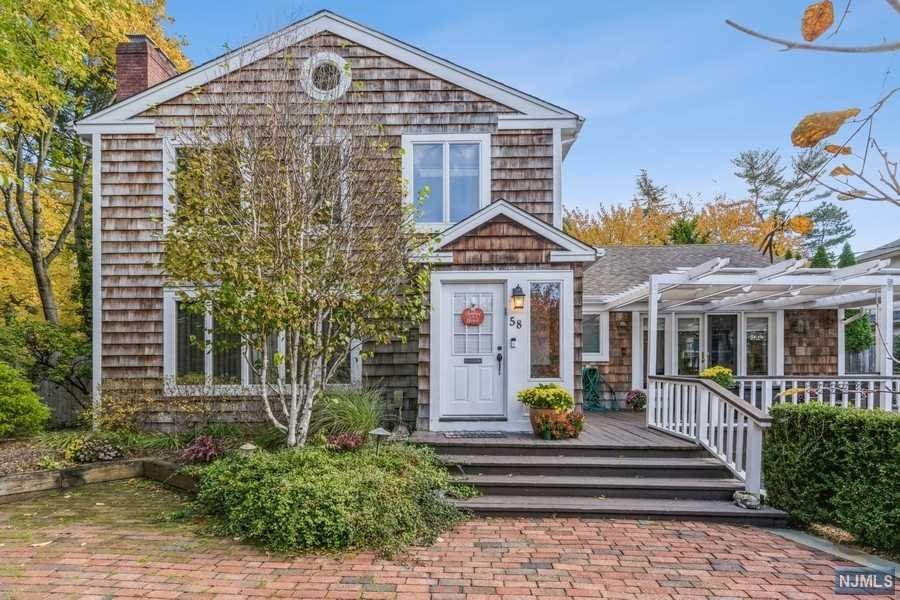 Renovated with modern touches, this move-in ready, east hill colonial is located in the desirable Cotswold neighborhood, close to schools, transportation, town and places of worship. The highlight of the home is its sun drenched, white kitchen renovated with stainless steel appliances and open floor plan shared with family room with additional work/homework space. Also on first floor, large formal living room and formal dining room both w/separate fireplaces. Off both living room and family room is large front porch, perfect for entertaining and socializing. Upstairs, Primary Suite w/ fully renovated spa-like bath, 2 large bedrooms and full bath and unfinished space for storage or potential living space. Full finished walk out basement includes bedroom, full bath, rec areas, 2 car garage and renovated laundry room. The backyard is fully fenced in and professionally landscaped. Home is equipped with speakers and security throughout. A perfect home!