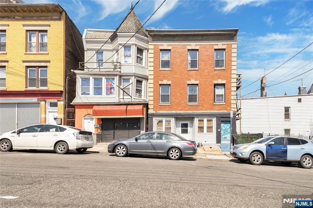 Well-maintained 3-family brick property located in the desirable North Newark section, just moments from Branch Brook Park. Unit 1 and 3 features 2 bedrooms and 1 full bath, offering strong rental potential and consistent layout appeal. Unit 2 is a one bed one bath. Conveniently situated near downtown Newark, major shopping, universities, NYC transportation, and public transit options. Ample on-street parking available, with a community garden adjacent to the property adding to the neighborhood charm. Low property taxes enhance investment value. Ideal for both investors and owner-occupantsâ€”donâ€™t miss this opportunity!