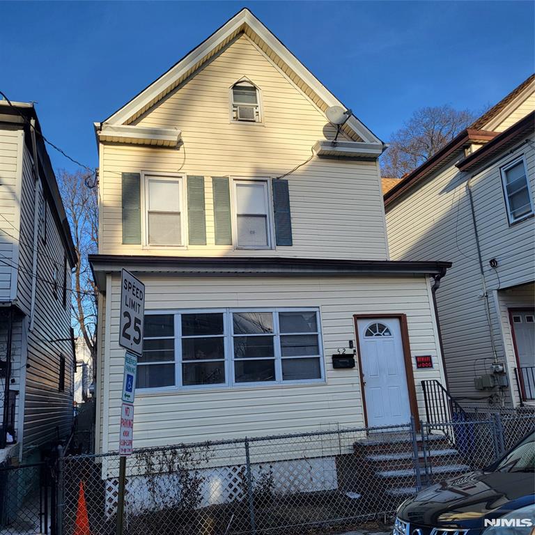 Welcome to this spacious one-family home offering 5 bedrooms and 2 full bathrooms. The main level features a bright living room and a formal dining room, perfect for everyday living and entertaining. A fully finished basement provides additional living space, ideal for a family room, home office, or recreation area. Conveniently located near a variety of delicious local restaurants, with downtown Passaic shopping just a short walking distance away. Close to public transportation and approximately a 30-minute drive to New York City, making this home ideal for commuters. A must-see opportunity offering comfort, space, and convenience.