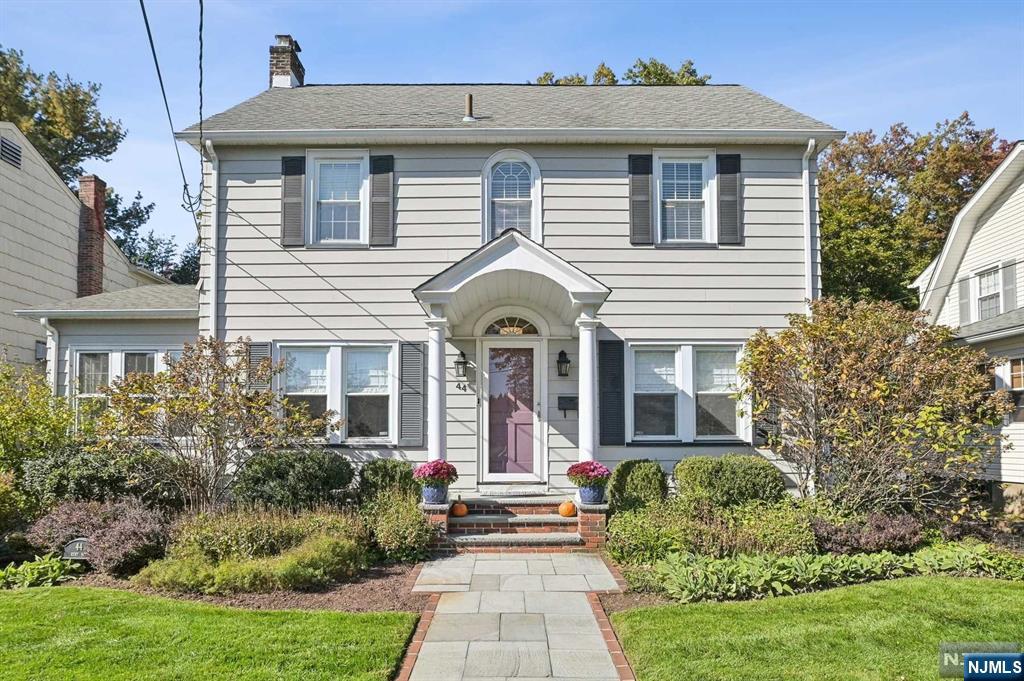 Welcome to this warm & inviting Center Hall Colonial in desirable Glen Rock! This charming home offers wood floors, and formal living rm (refaced gas firepl) & dining rm. The EIK is updated w/granite counters & dining area w/slider to yard. The first floor family rm offers wood burning fire pl & built-in shelving, w/wood millwork throughout. Side entry door fr driveway. The main flr includes a bonus rm off living rm, an office w/ built-in desks & shelving.The 2nd flr boasts primary bedrm w/full primary bath, two additional bedrms & main bath. Full basement with rec rm & 1/2 bath. Unfinished section offering laundry area, utilities & great storage. 2-car detached garage w/newer garage doors and private paver patio.Full house water filtration, including reverse Osmosis filtration system for drinking water & water softener. Recent updates Boiler, central air, garage doors, dishwasher, lighting, most windows & ceiling fans. Top rated schools, easy Commute to NYC,bustling downtown are