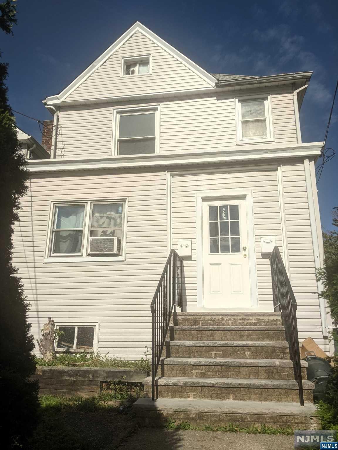Bring your imagination and your tool belt and make this two family home a great investment. The possibilities are endless...good location close to stores, transportation, schools and shopping. 2, 2-bedroom apartments with large eat-in kitchens. First floor has hardwood floors, charm, sun room/mudroom. Second floor has door to deck accessable from the yard, and a walk-up attic. Large, unfinished basement. All separate utilities. 3-Car Detached block garage.