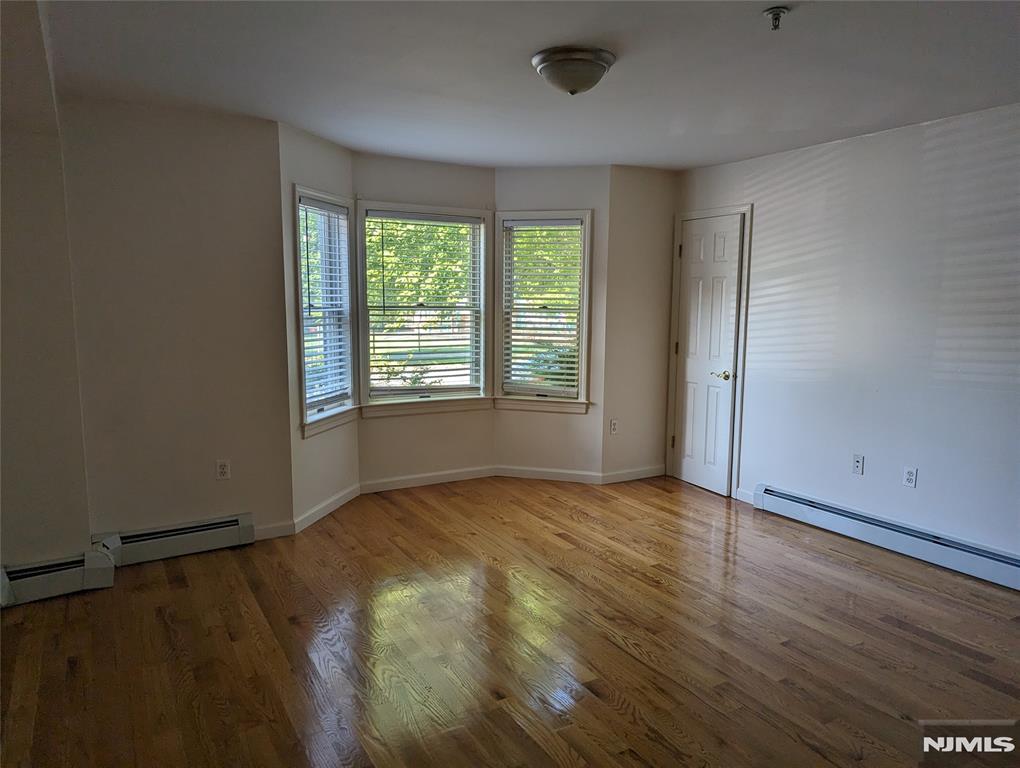 Renovated 1 BR Apartment on the second floor New Kitchen with Stainless Steel Appliances. Hardwood Floors. Sunny and Spacious Apartment. Great Like-New Building with parking included, laundry room and elevator. Located in Englewood and one block from Tenafly. Close to Cresskill, Fort Lee, Englewood Cliffs, Leonia, Cresskill, Teaneck, Alpine... Bus to New York City right outside, less than 2 minute w. Great neighborhood and area. Shopping at Walgreens less than 2 minute w as well. Other major shopping about 1 mile away. Laundry in building. Elevator