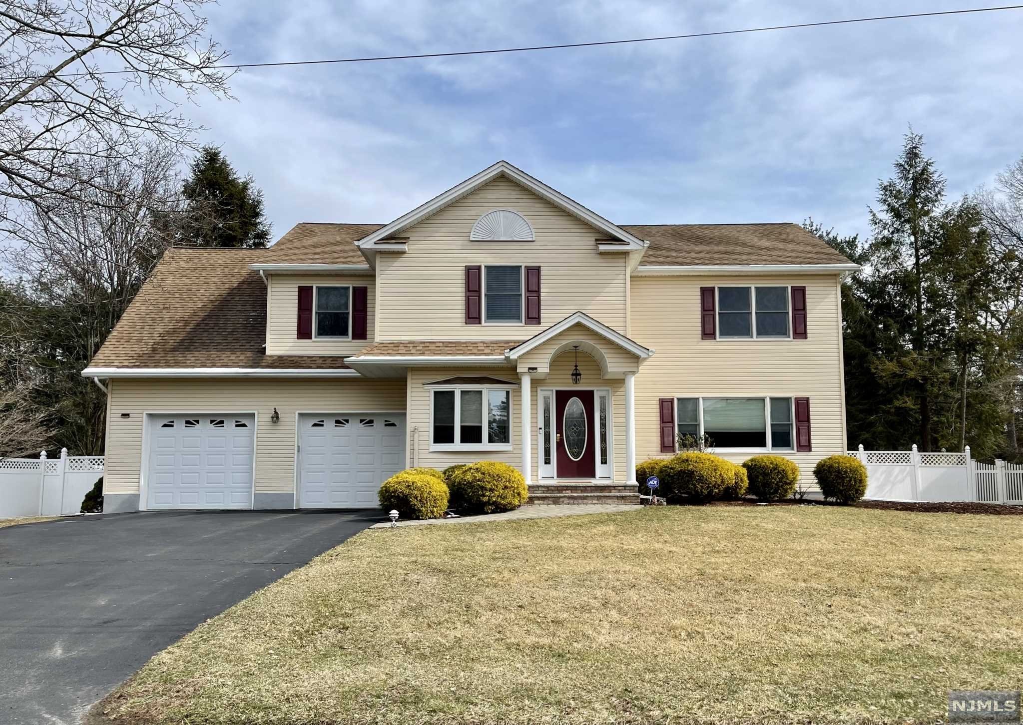 Beautiful, spacious, updated colonial nestled on a 100 x 122 property, featuring 4 bedrooms, 4 full baths, finished basement, 2 car garage, hardwood floors on first and second floors, open floor plan, primary bedroom with sitting area, full bath and walk-in closet, 3 additional bedrooms, 2 with walk-in closets.. There is a finished basement with bar, fenced back yard and large deck and above-ground pool for entertaining. Close to NYC bus transportation. Easy NYC and Westchester commute. Click on the Virtual Tour!