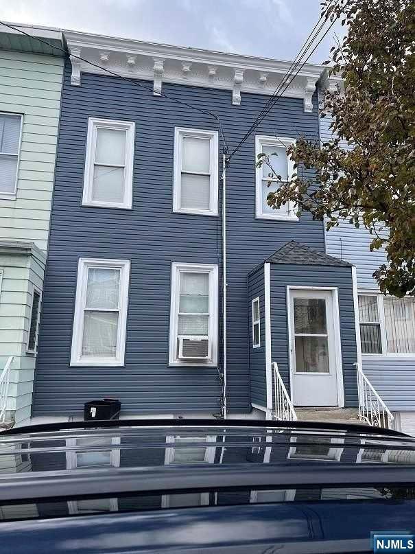 Welcome to this renovated 3-bedroom, 1-bathroom row house that seamlessly combines classic elegance with modern comfort. Nestled in a desirable neighborhood, this home offers a unique blend of historic character and contemporary convenience. First floor open area Living room and dining room have an abundance of natural light streaming through the large windows creates a bright and airy atmosphere, making each room feel open and welcoming. The well-designed kitchen featuring modern appliances, ample cabinet space, and granite countertops Conveniently located near shops, restaurants, and public transportation to NYC. experience the allure of urban living. PROPERTY IS SOLD "AS IS" BUYER RESPONSIBLE FOR C/O AND FIRE AND ALL COSTS WITH THOSE INSPECTIONS.