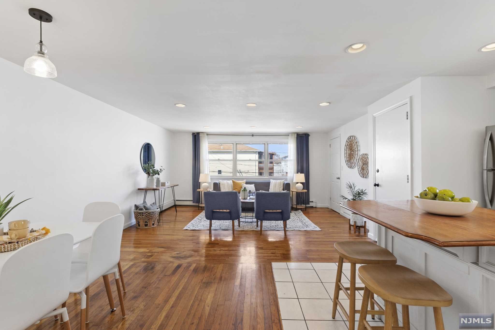 Can't beat the location! An easy walk or bike ride to Journal Square Path. You can go for an early morning swim at the Olympic sized pool or run at the neighborhood favorite Pershing Field Park. Take a stroll on Central Ave where you will enjoy popular eateries, cafes, and vegan delights! This wonderful two family can serve as your investment property entirely or make it your primary residence and rent the other! Due to its excellent location, spacious layout and comfortable bedroom count (3 bedrooms 1 bath for each unit) you will enjoy collecting a premium in rents. This two-family property in Jersey City Heights, also offers a remote controlled 2 car garage and 2 car driveway. You get a bonus basement with a very nice layout, very good ceiling height waiting for your personal touch! These apartments are in very high demand easily generating above market rate rents. The second-floor unit is newly renovated.