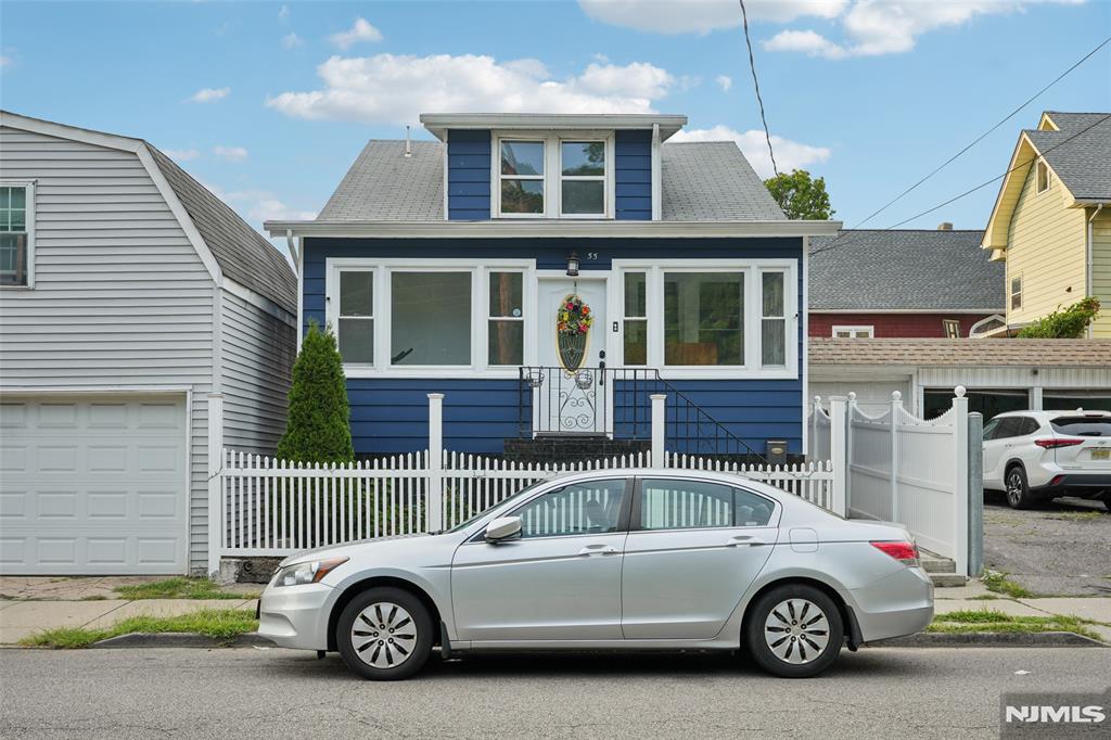 This beautifully maintained 4-bedroom, 2-bath home offers a spacious and versatile layout, including an additional family room in the basement. The large backyard features a charming gazebo, providing an inviting space for relaxation or outdoor gatherings, with ample room for play or gardening. A one-car detached garage is accessible via a shared driveway. Please note: the driveway easement provides access to the garage only; parking is not permitted in the driveway. Ample street parking is available. Conveniently located near public transportation, recreational parks, and local amenities. Property is being sold in as-is condition.