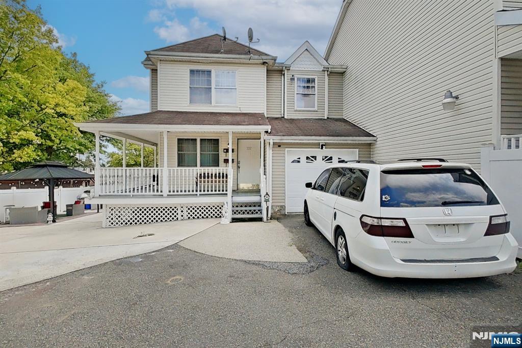 Welcome to 337-341 18th Ave, Newark, NJ! This well-maintained expanded duplex offers the perfect combination of comfort, space, and convenience. Featuring 3 bedrooms, 1 full bath, and 1 half bath, the home boasts a bright living room, formal dining room, and a functional kitchen with ample cabinet space. The ground level includes a laundry room and an attached garage, while the second floor offers a spacious primary bedroom and two additional bedrooms. Enjoy central air, hardwood floors, a private driveway with additional off-street parking, and a beautifully fenced backyard complete with an above-ground pool and deckâ€”perfect for relaxing or entertaining. Conveniently located near schools, parks, shopping, houses of worship, and public transportation, with easy access to major highways. This move-in-ready home is a wonderful opportunity to enjoy comfortable living in a convenient Newark location. Schedule your private showing today!