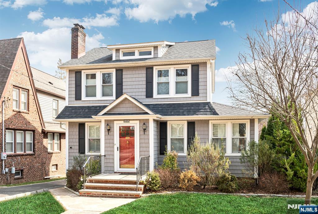 The curb appeal of this move-in ready home catches your attention from the moment you see it. Enjoy an extra deep 50x132 property with flowering plants, large paver patio, private yard, and a finished 2 car garage w/ bonus loft storage. The main floor has great energy, offering a gorgeous granite kitchen w/ breakfast bar & stainless steel appliances. Upstairs you'll find 3 bedrooms, a modern bathroom, and a walk-up storage attic (expansion potential). The finished basement w/ high ceilings hosts the 4th bedroom, 2nd full bathroom, a large recreation room, and ample closets & storage. Central air, in-ground sprinklers, surround sound, and updated utilities make this home an exceptional value. Brand new sewer line in 2024 and many upgrades made around 2016 (Roof, Gutters, Siding and Windows). Prime West Englewood area conveniently located near NYC bus, schools, houses of worship, restaurants, shopping and parks. Listed by Eric Wein (201-410-1556 /Eric@WeinAgency.com).