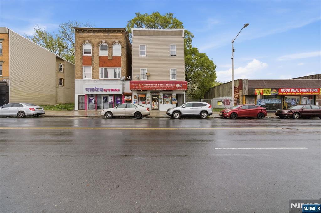 Turnkey Mixed-Use Gem on Springfield Avenue! Welcome to 492 Springfield Avenue in Newark, NJ an exceptional investment opportunity combining strong income potential with prime commercial exposure. This versatile property features two generously sized residential units, each offering 3 bedrooms and 1 full bath, thoughtfully designed with separate utilities to maximize convenience and efficiency. The street-level commercial space presents endless possibilities perfect for retail, office, or service use while benefiting from outstanding visibility along one of the West Side's most active corridors. High foot and vehicle traffic make this an ideal setting for attracting steady business. Ideally located near public transportation, schools, shopping, and neighborhood amenities, this property appeals to both quality tenants and thriving businesses alike. Positioned in a rapidly developing area, it offers incredible upside for investors, owner-occupants, or entrepreneurs seeking a dynamic live-work setup. A rare chance to secure a high-performing asset in one of Newark's growing districts don't let this opportunity pass you by!