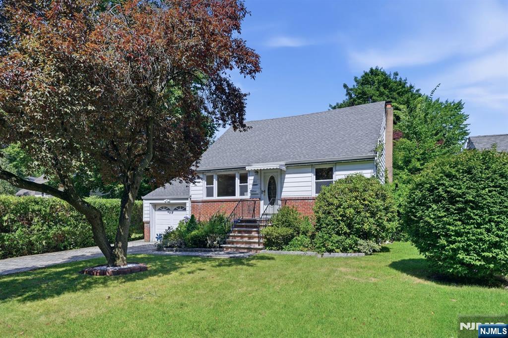 Beautifully renovated and completely move-in ready, this exceptional 4-bedroom, 2-full-bath expanded Cape Cod offers the perfect blend of modern updates, versatile living space, and classic charm. Meticulously maintained throughout, the home features an updated eat-in kitchen, two beautifully renovated bathrooms, recessed lighting, central air conditioning (2021), and a 200-amp electrical service. The sun-filled first floor includes a spacious living room, formal dining room, two generously sized bedrooms, a full bathroom, and an oversized eat-in kitchen with ample cabinetry, expansive counter space, and an additional dining area perfect for everyday living and entertaining. Upstairs, you'll find two additional bedrooms and a stylishly updated full bathroom, offering plenty of flexibility for guests, a home office, or a growing family. The fully finished basement spans the entire footprint of the home, providing an abundance of additional living space ideal for a family room, game room, home gym, media room, or entertaining. Outside, enjoy a large private backyard that's perfect for outdoor gatherings, play, or relaxing. Additional highlights include an attached one-car garage, a driveway with parking for multiple vehicles, and numerous quality updates throughout. Offering the space, updates, and convenience today's buyers are looking for, this turnkey home is a rare opportunity. Simply unpack and enjoy everything this beautifully updated Cape Cod has to offer.