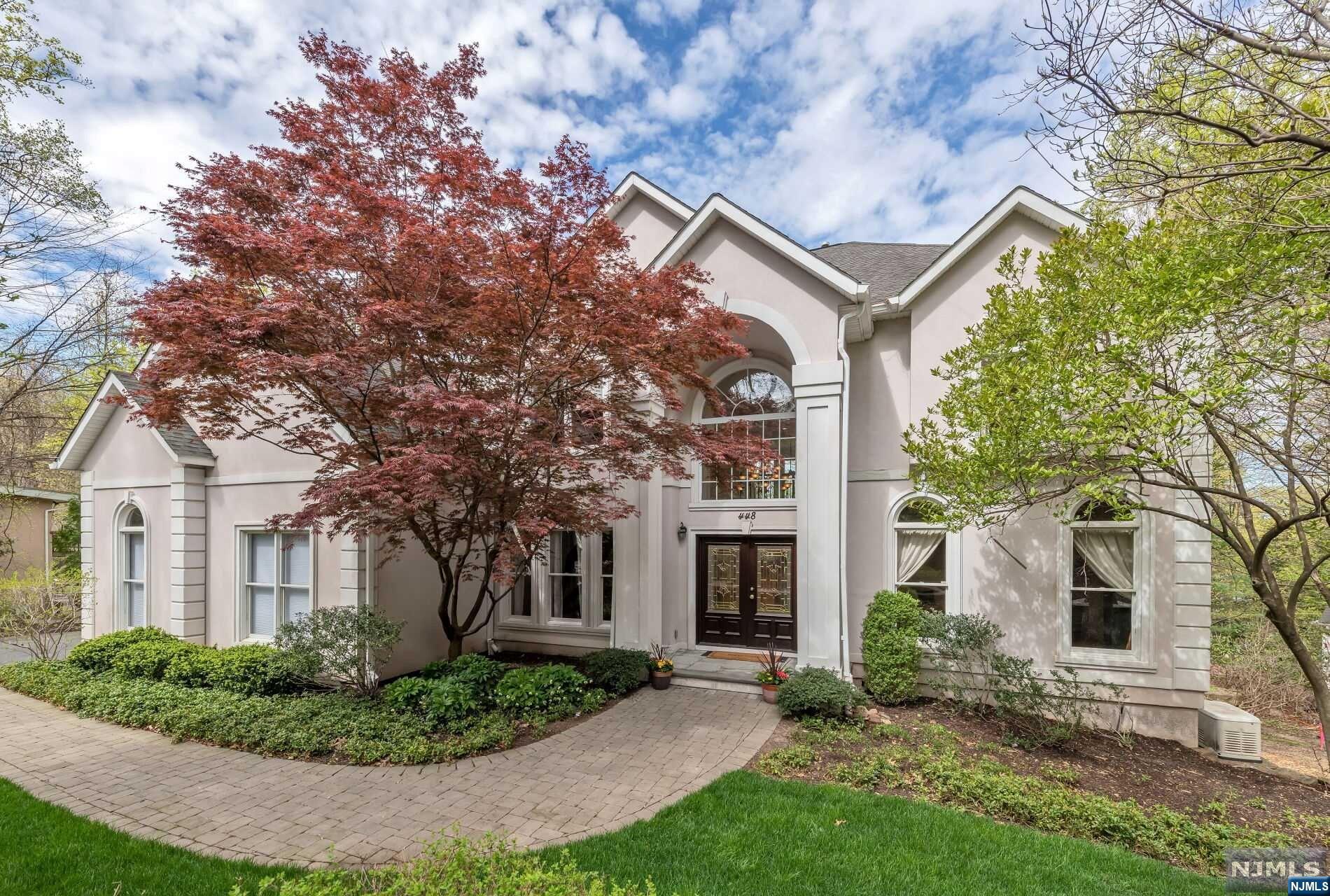 OWNERS WILL ACCEPT BEST & FINAL OFFERS BY 4PM TUESDAY, 5/21 Step into this East Hill Englewood home that effortlessly blends sophistication and relaxation, providing the perfect balance throughout every inch of living space. From the moment you enter, you'll be greeted by an abundance of natural light designed for style and comfort. The layout is perfect for both intimate gatherings and larger get-togethers with spacious living and dining areas. The first floor also features an ensuite guest room, family room and updated modern kitchen with ample storage and easy access to a spacious deck, perfect for outdoor entertaining. The second floor boasts four additional bedrooms, two ensuite one of which is the luxurious primary and 2 bedrooms connected by a Jack and Jill bathroom. The ground level walkout is a haven for entertainment and relaxation, featuring a spacious recreation room, an additional bedroom, and a gym.