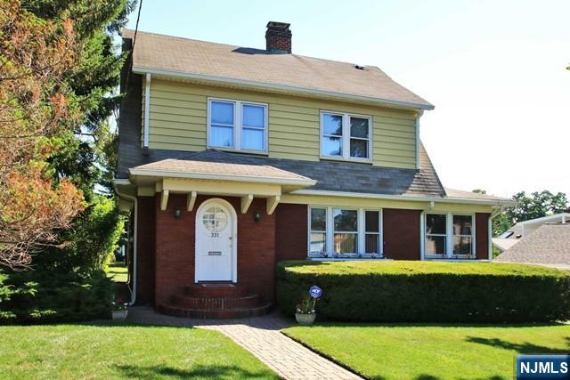 Charming and timeless, this traditional Dutch Colonial blends classic character with thoughtful modern updates. Featuring 3 spacious bedrooms and 2.5 bathrooms, this meticulously maintained home is move-in ready and tastefully decorated throughout. The inviting first floor offers a warm living room with a fireplace, a formal dining room, full bathroom, eat-in kitchen, and a cozy den/office. Additional living space includes a finished third floor and a fully finished basement providing more flexibility. Original chestnut woodwork, gorgeous refinished hardwood floors, cedar closets, and four stunning stained glass windows add exceptional charm and architectural detail. Recent updates include replacement windows throughout, updated electrical service, central air conditioning, new roof and a security system. Set on a professionally landscaped property with an underground sprinkler system, this home also features a brand-new rear deck and detached garage. A rare opportunity to own a beautifully preserved and updated home offering character, comfort and outstanding value in todayâ€™s market.